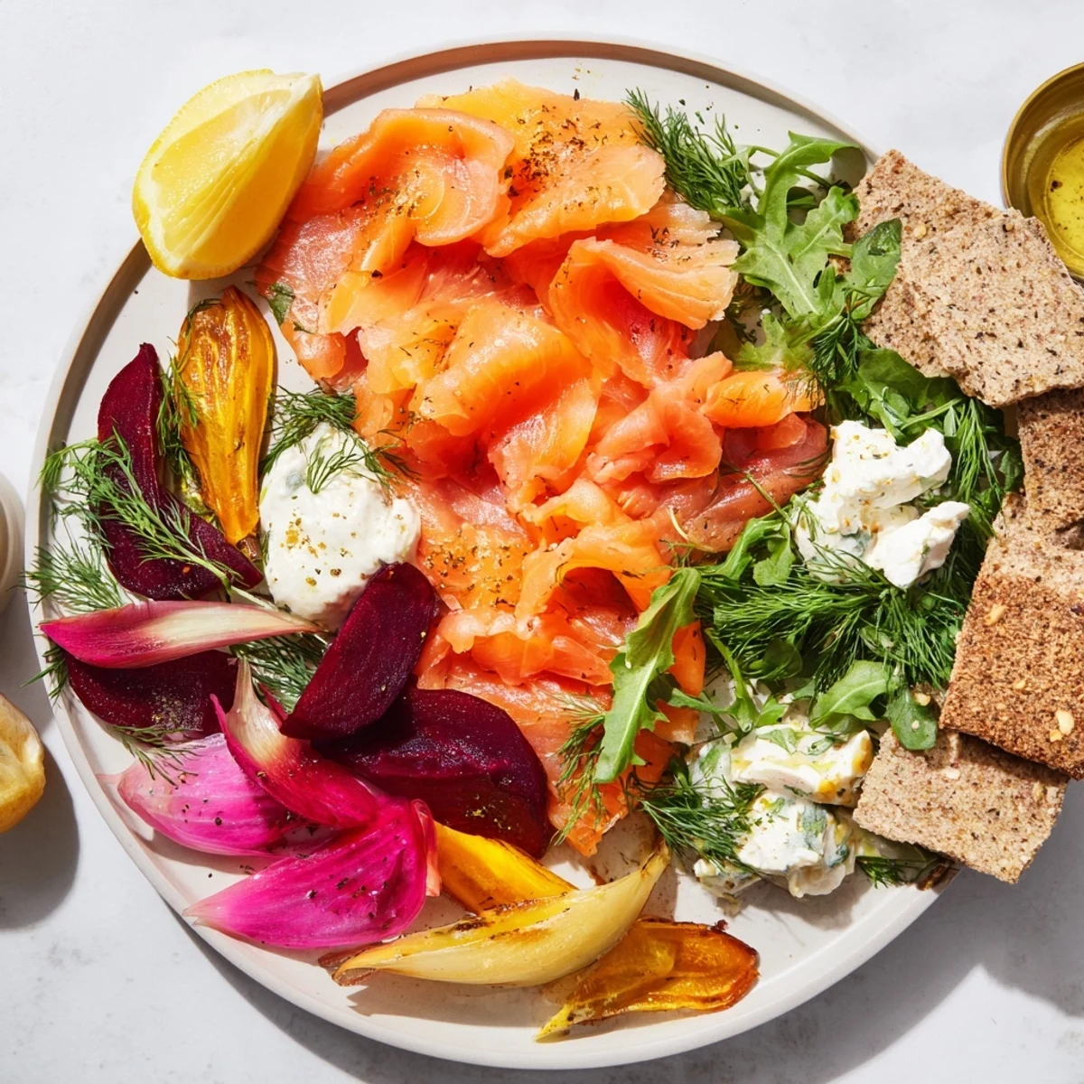 Vibrant Winter Harvest Smoked Salmon Board, brimming with colorful vegetables, cheeses, and crusty bread.
