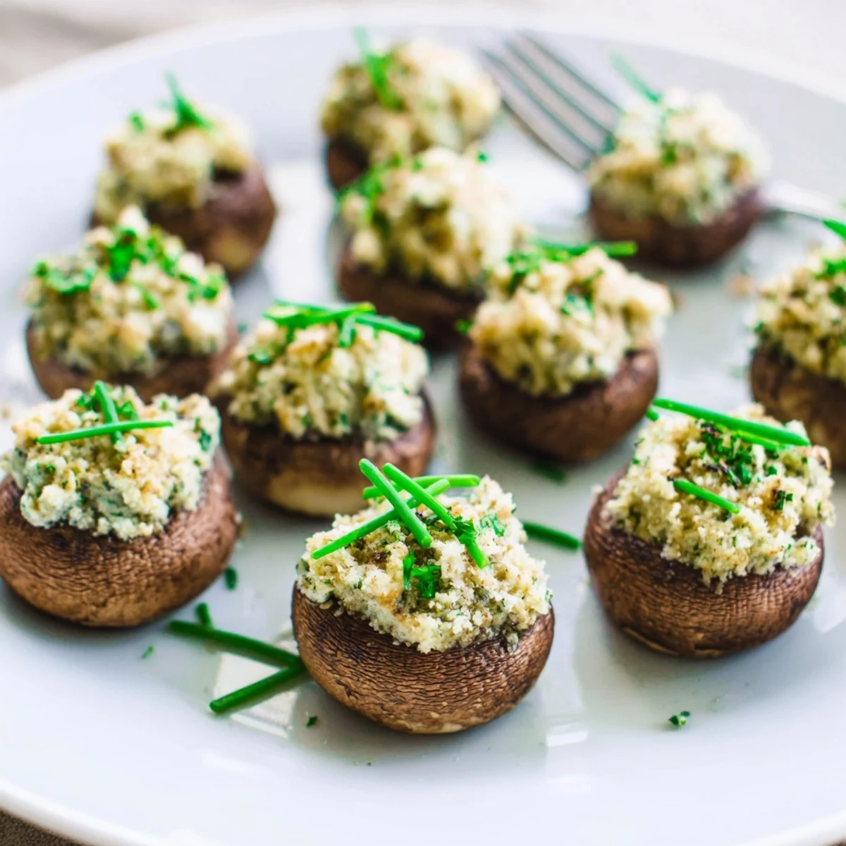 Golden-brown Stuffed Mushroom Caps, arranged in a ring, ready for a delicious appetizer.
